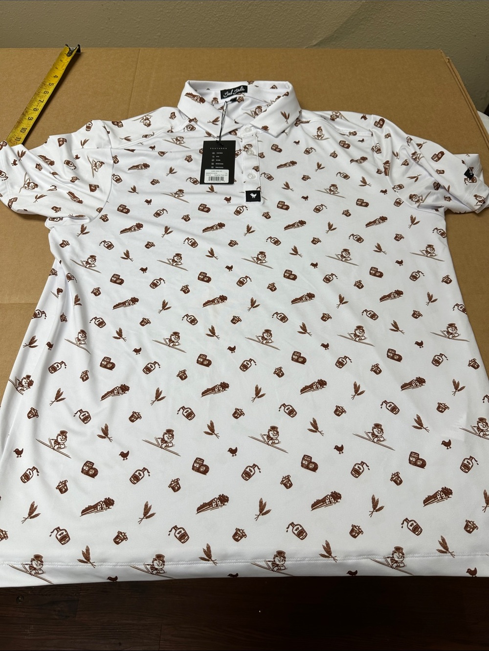 #137, Men's XL, Bad Birdie White Polo with Brown All-Over Motif